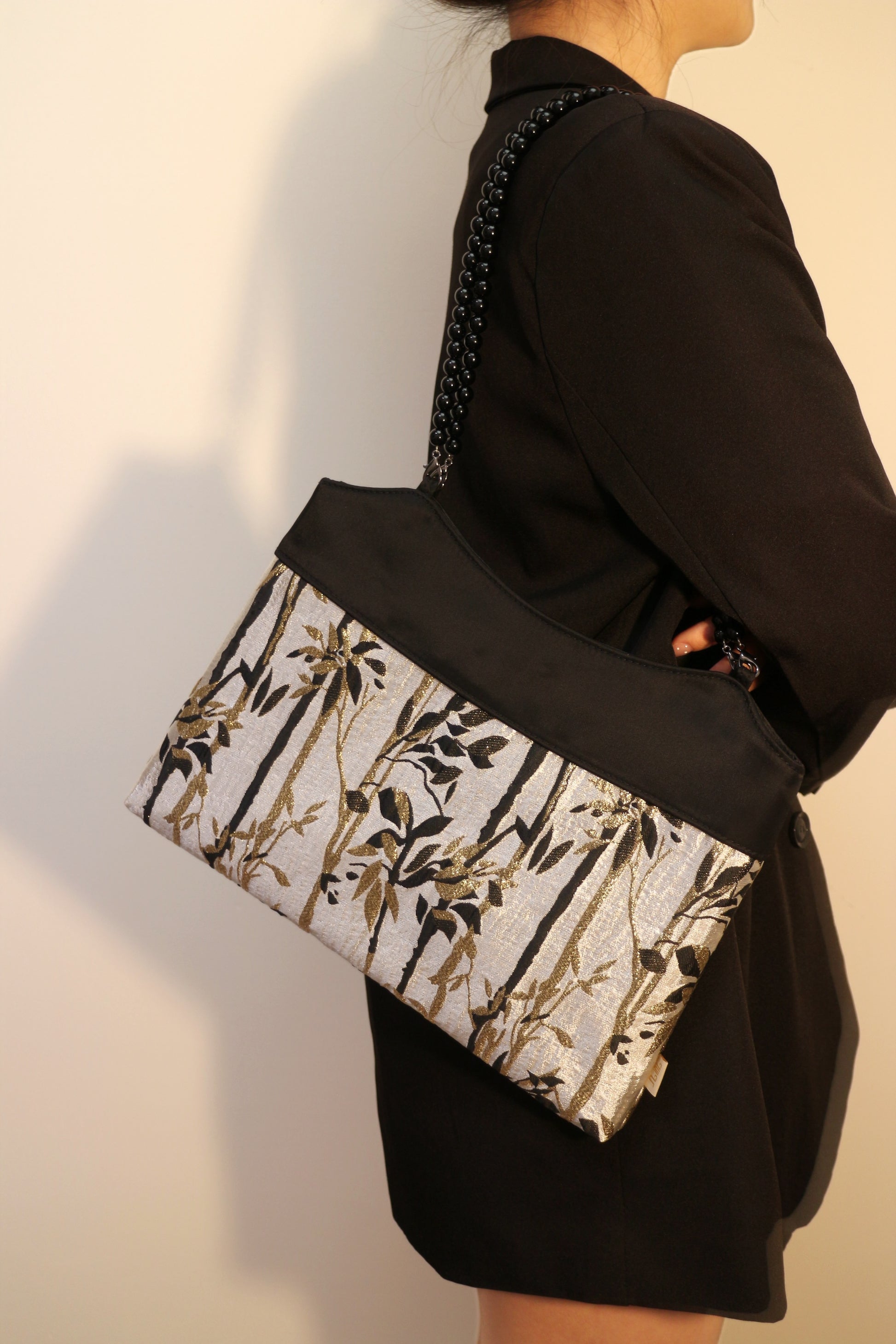 Bamboo Pattern Embossed Shoulder Bag