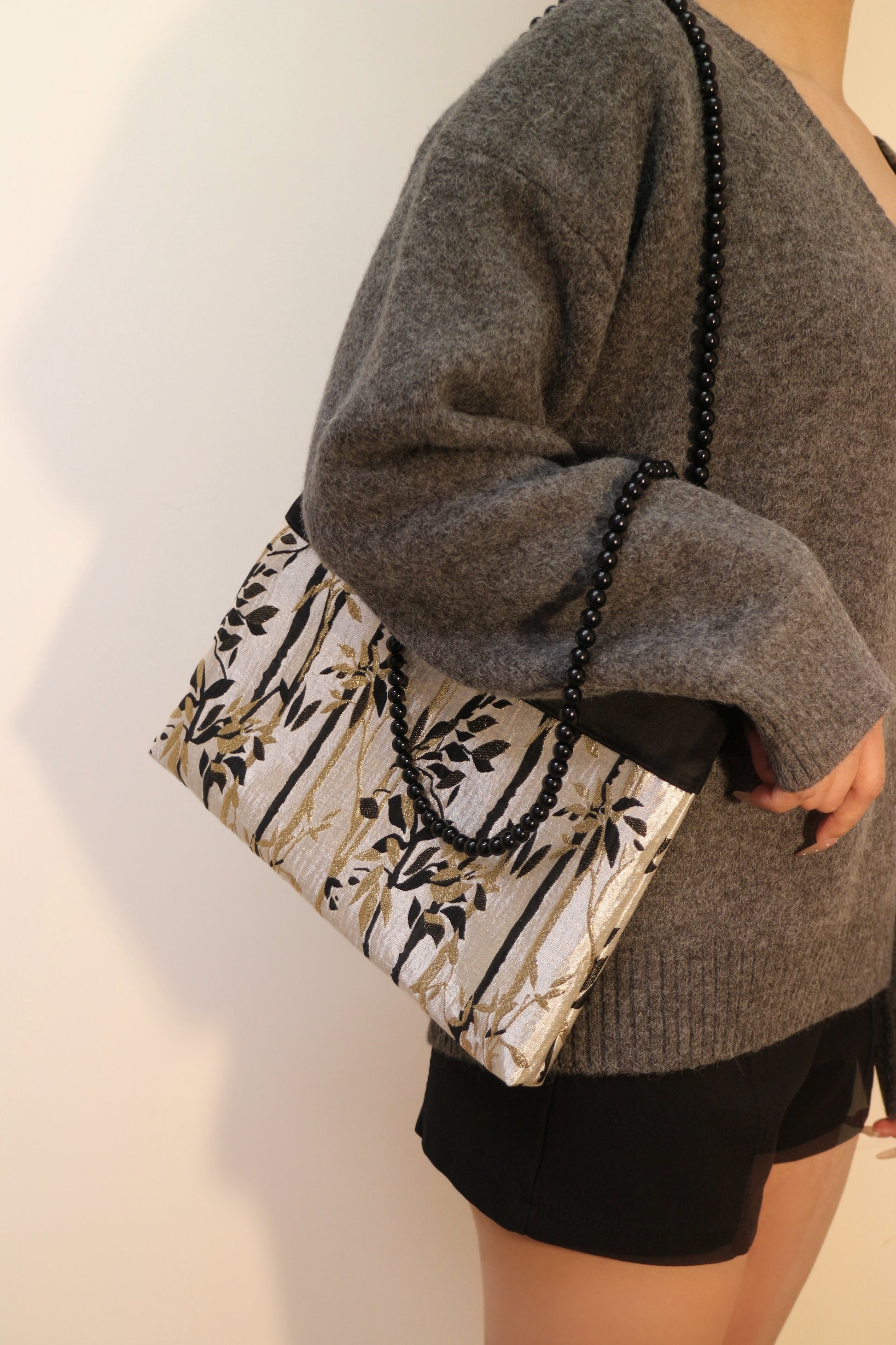Bamboo Pattern Embossed Shoulder Bag